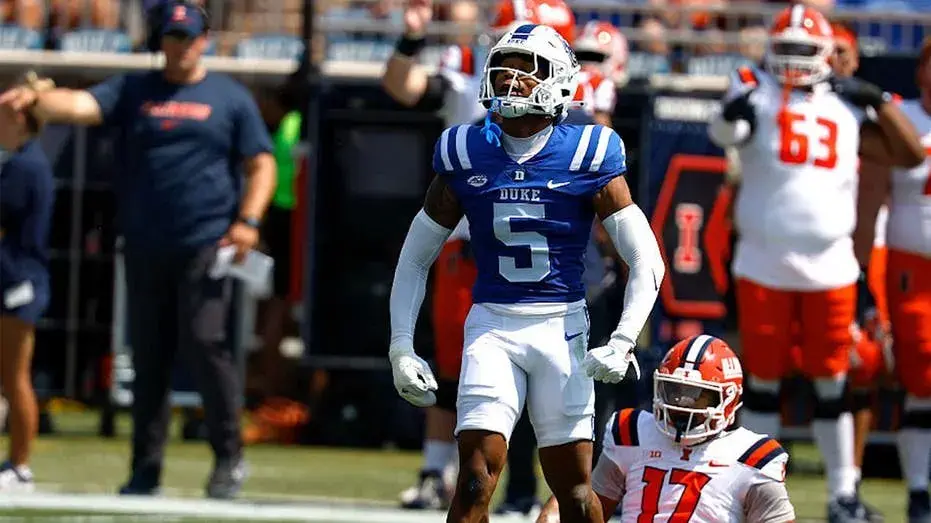 Duke football player apologizes to trainer after swatting her arm away during injury timeout