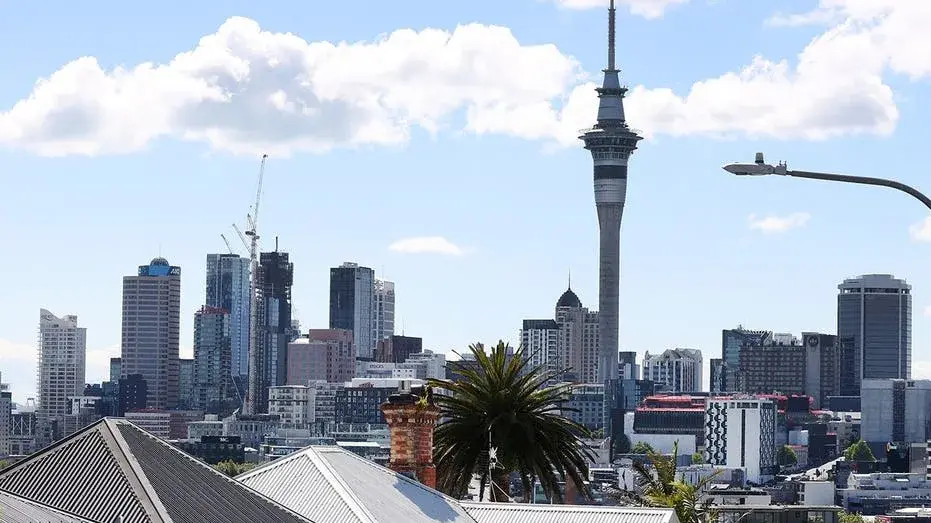 Tourist dangles 23 stories above busy street in 'reckless' daredevil stunt