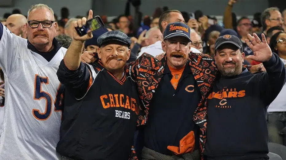 Bears fans don Mike Ditka's famous mustache as franchise legend honored at first home game since death