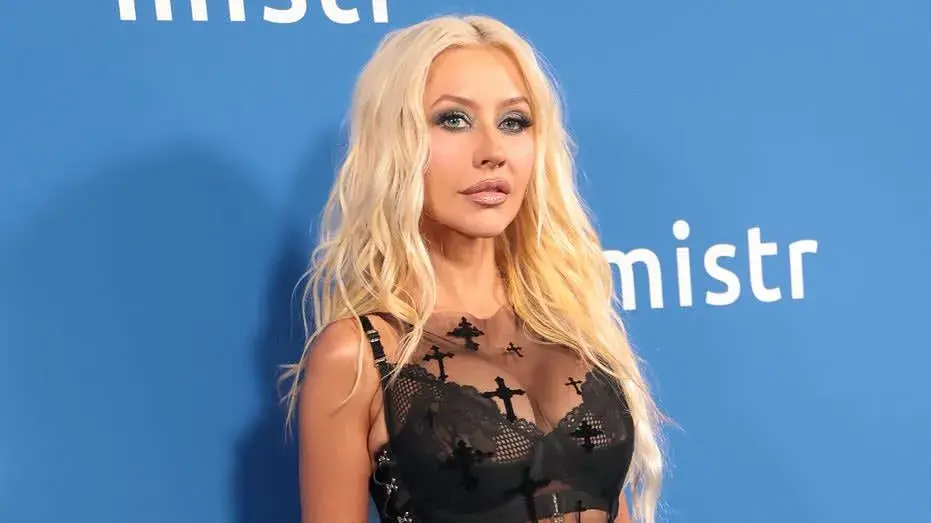 Christina Aguilera strips down in steamy bathtub snap with cheeky Halloween twist