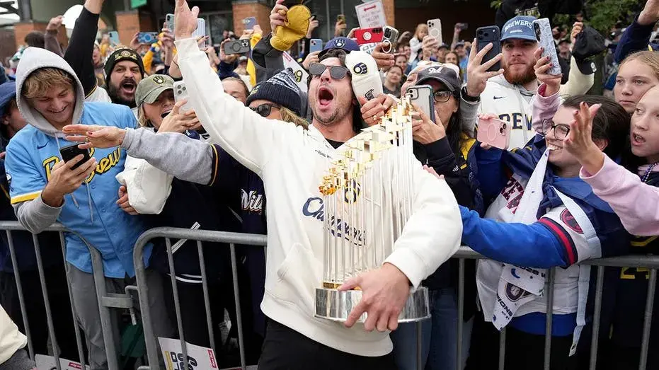 Brewers' World Series celebration gets rowdy as star makes outrageous beer promise, coach sings karaoke