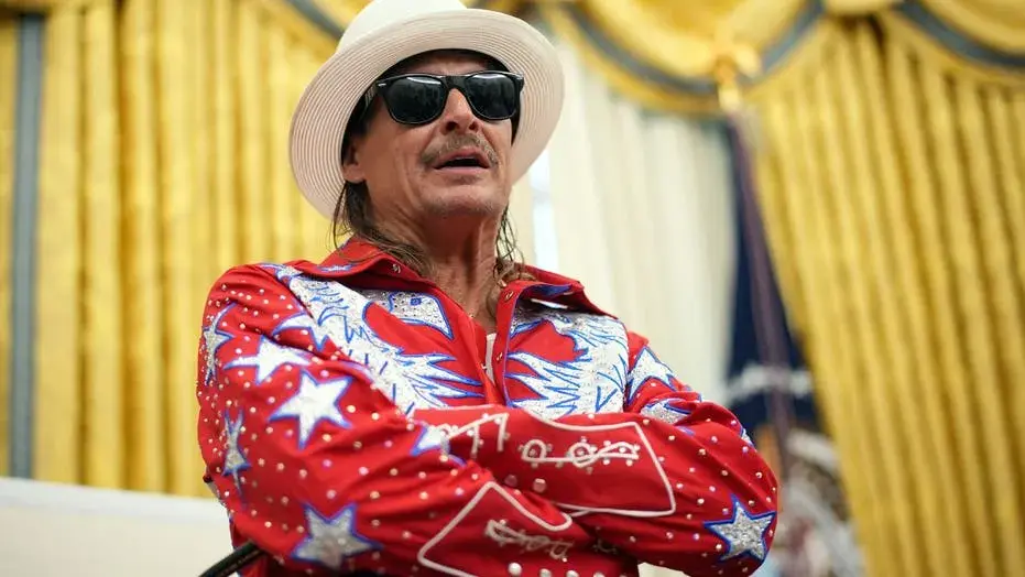 Kid Rock reveals what he told French President Macron after Trump unexpectedly handed him phone on golf course